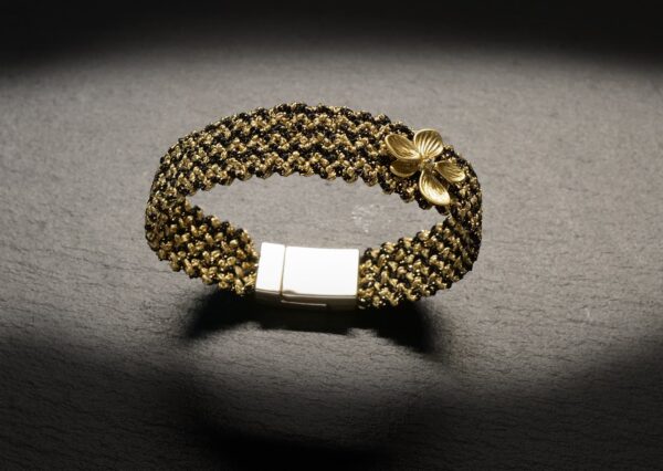 woven bracelet in black gold